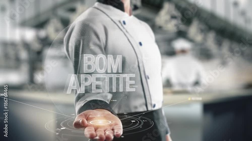 Chef holding in hand Bom Apetite photo