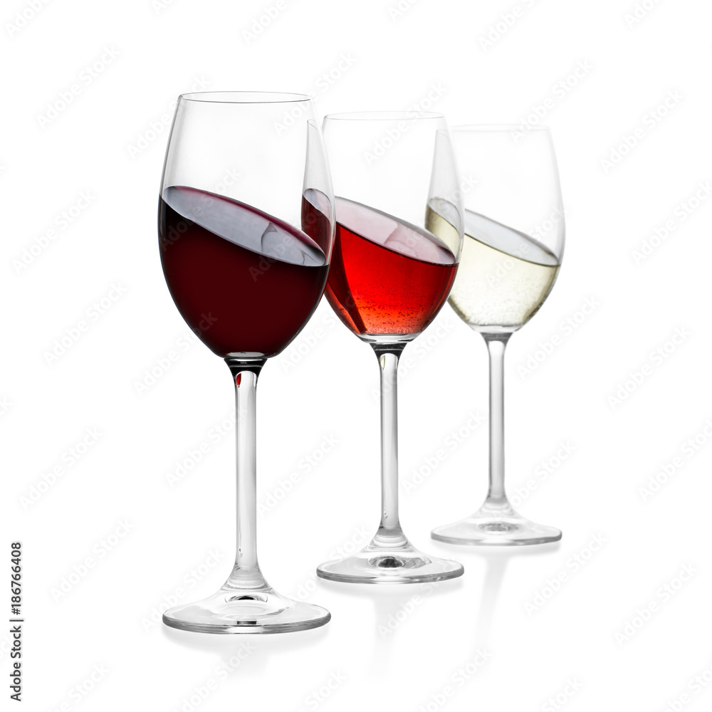 Red, rose and white wine in glass, isolated
