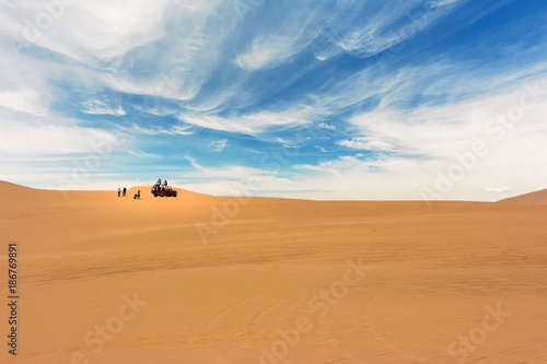 Dune buggy crossing the desert in Huacachina, Ica, Peru
