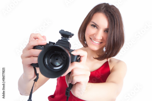 Girl with a camera. The gir...