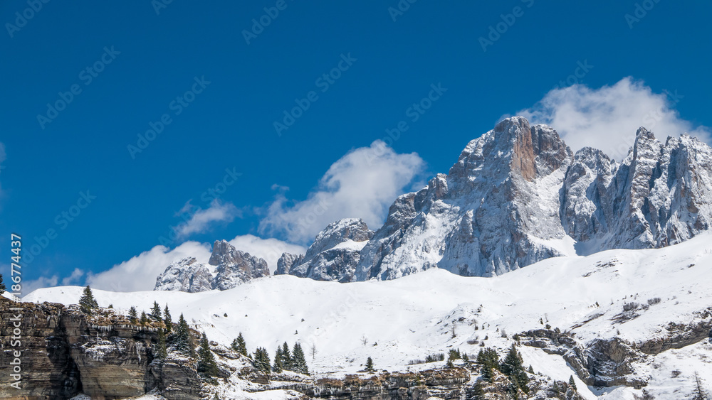 Alpine mountains in bright and warm winter sun