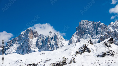 Extreme winter landscape of Dolomites seen from Passo Rolle, Italy
