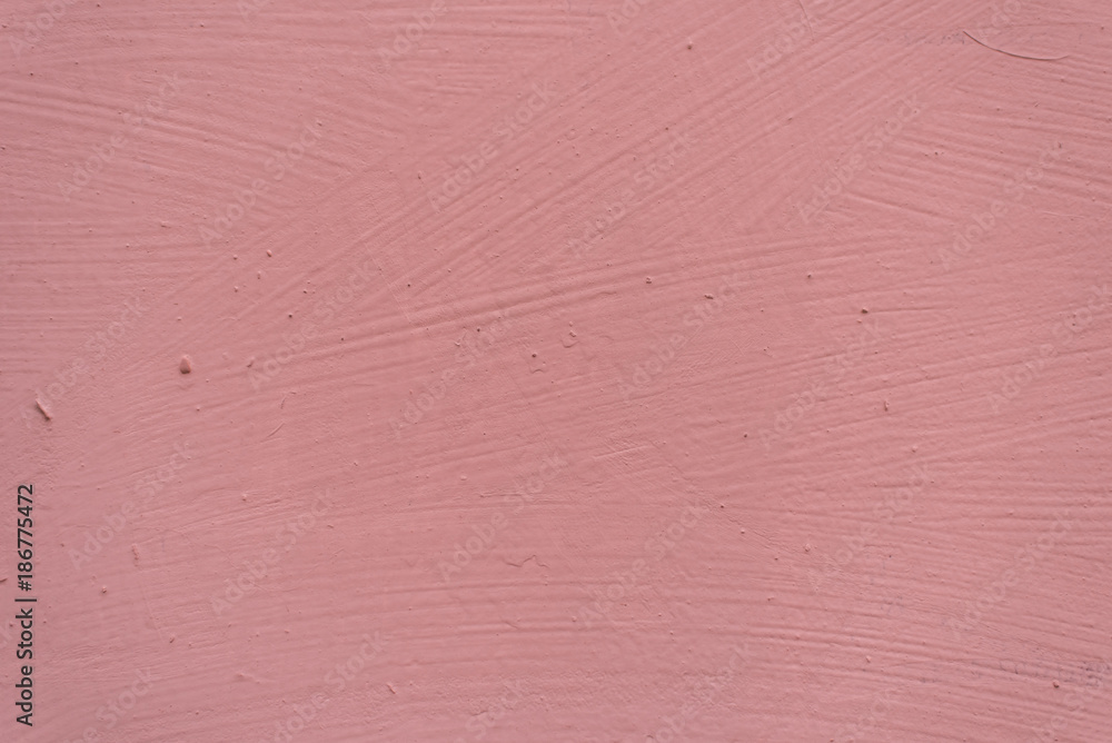 Fototapeta premium Painted pink surface with paint smears