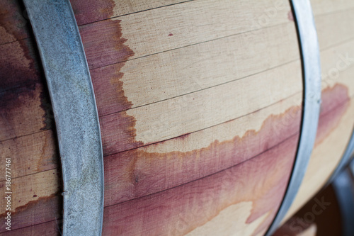 Photos close up of a red wine wood barrel