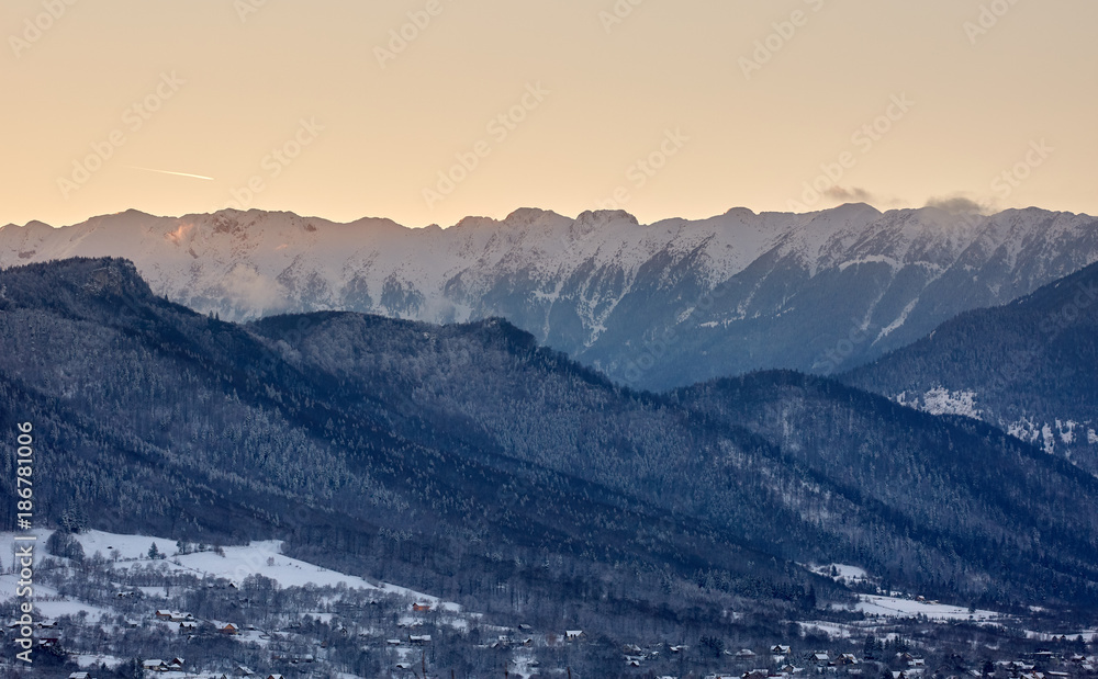 Mountains with snow in the sunset