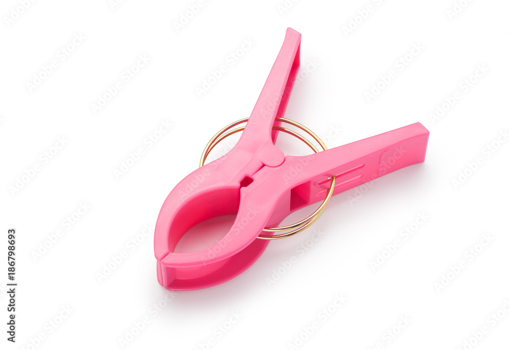 Red plastic clip isolated on white background Red plastic clip isolated on white background