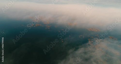 Wallpaper Mural Aerial View. Flying over the clouds . Aerial camera shot. During the sunset. Landscape panorama. Torontodigital.ca