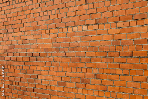brick wall texture background material of industry building construction. Exterior urban background for your concept or project. Empty space for text and web design.