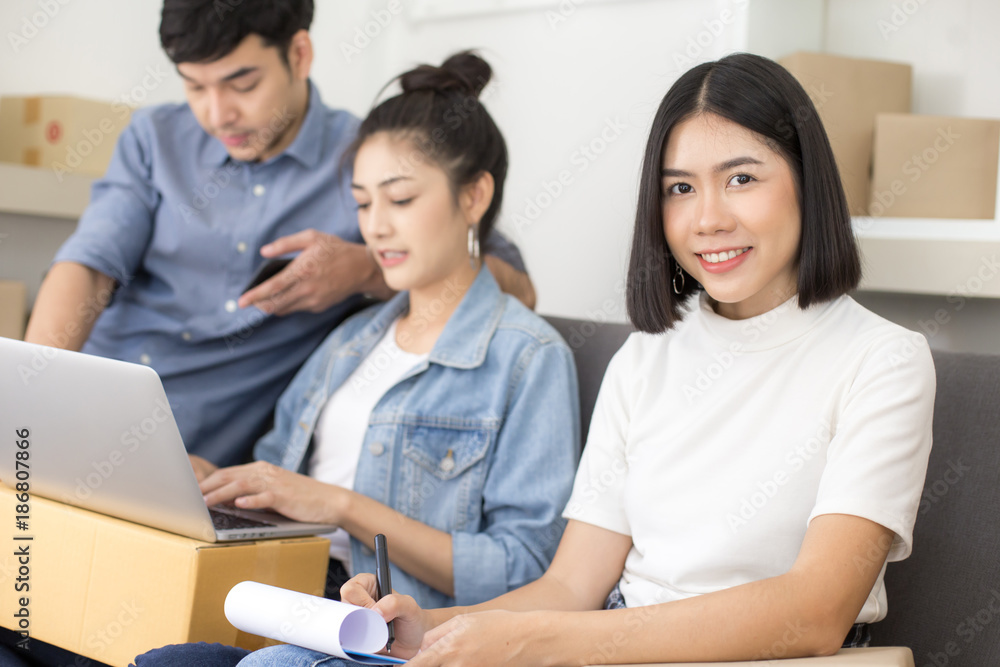 Group of Asian people working together for SME project. Young Owner people startup for Business Online, SME, Delivery Project. Online Business Concept. Group of Asian people working together for SME project. Young Owner people startup for Business Online, SME, Delivery Project. Online Business Concept.