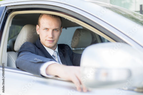 Businessman driving car. Man with transportation concapt. Man Driving car to go to Office.