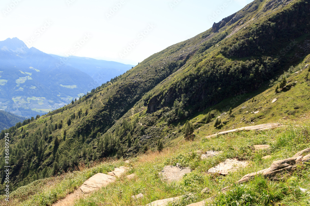 Hiking path and mountain alps panorama in the Texel Group, South Tyrol