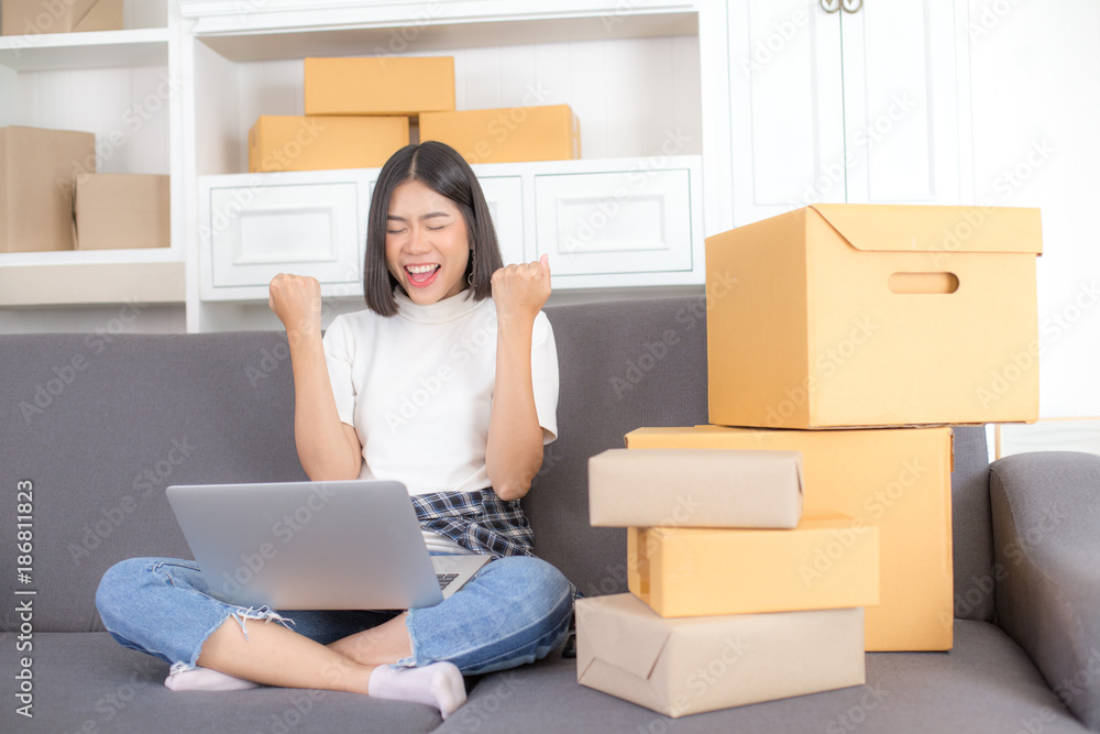 Asian woman success for online business or online marketing. People with SME, Delivery, Online Business success concept. Asian woman success for online business or online marketing. People with SME, Delivery, Online Business success concept.