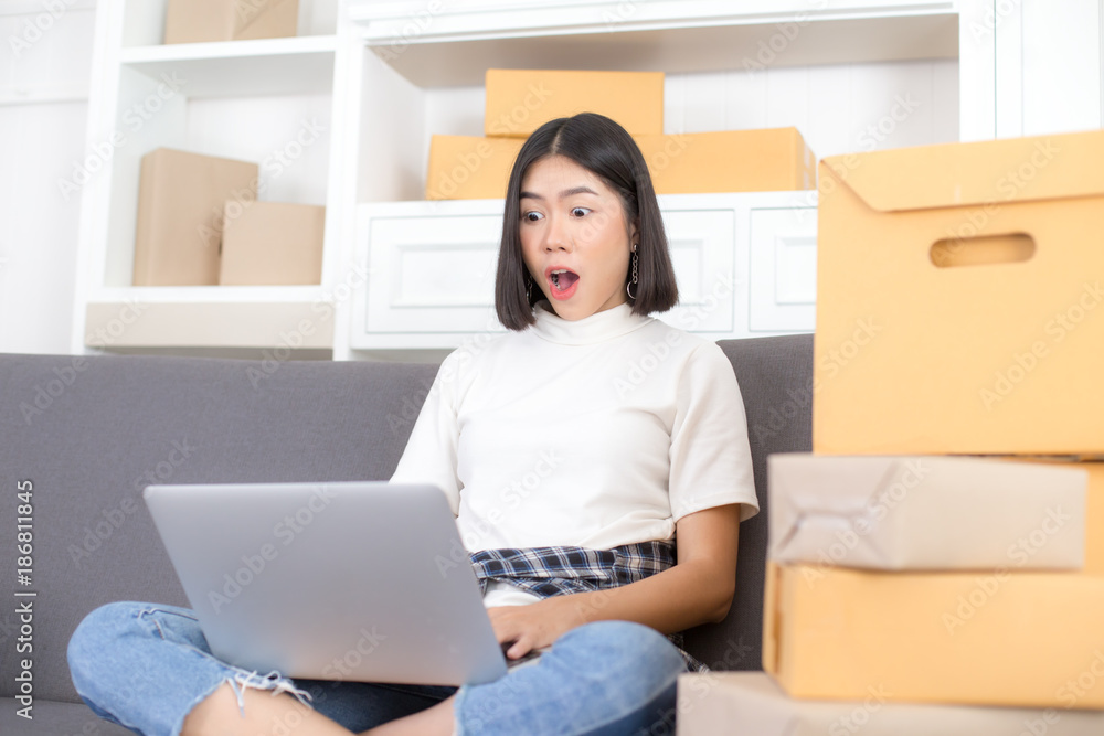 Asian woman success for online business or online marketing. People with SME, Delivery, Online Business success concept. Asian woman success for online business or online marketing. People with SME, Delivery, Online Business success concept.