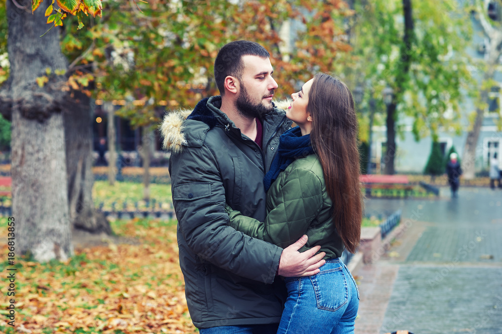 Fototapeta premium Young romantic couple in the city . A couple in love