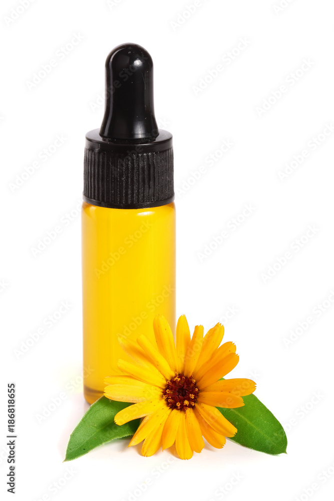 aromatherapy essential oil with marigold flowers isolated white background aromatherapy essential oil with marigold flowers isolated white background