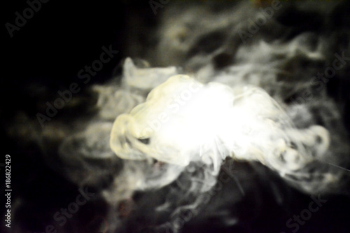 Fototapeta Naklejka Na Ścianę i Meble -  Blurred smoke on black color background