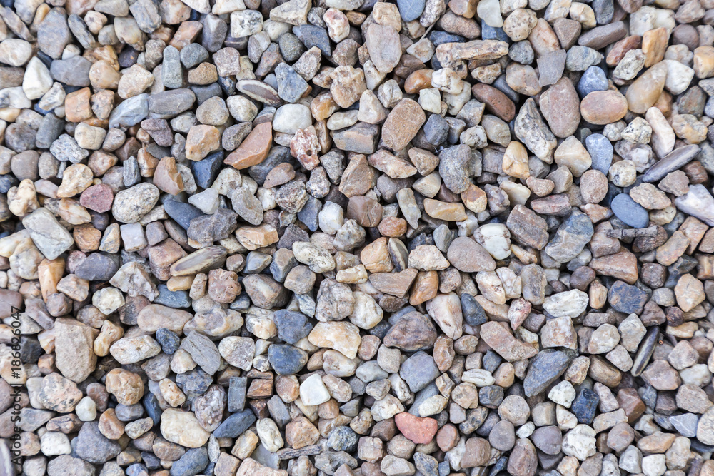 Stone pebbles texture or stone pebbles background for interior design business. exterior decoration and industrial construction idea concept design. Stone pebbles texture or stone pebbles background for interior design business. exterior decoration and industrial construction idea concept design.
