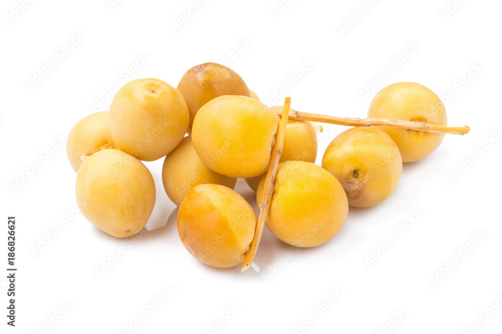 yellow raw dates isolated on white background yellow raw dates isolated on white background