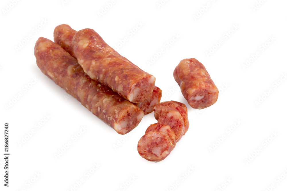 Chinese sausage and chinese sausage sliced for cook isolated on a white background Chinese sausage and chinese sausage sliced for cook isolated on a white background