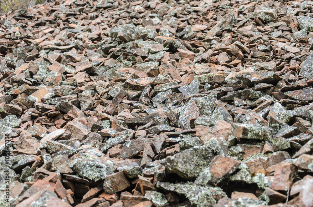 Texture - a pile of light granite stones, close up