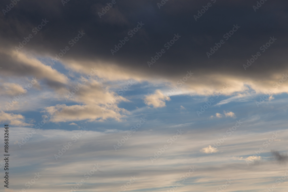 View of some backlit clouds at sunset