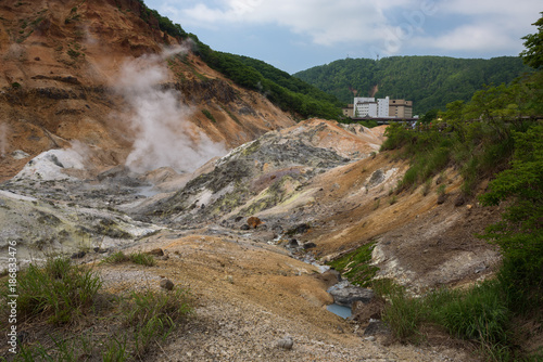 Smoke vents escaping from the earth’s surface in Hell Valley (Jigokudani), Noboribetsu, Hokkaido, Japan