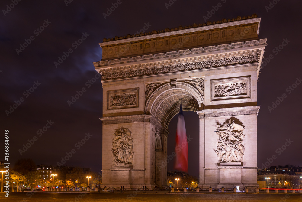 Paris Arc de Triomphe Triumphal Arch at Chaps Elysees at night, Paris