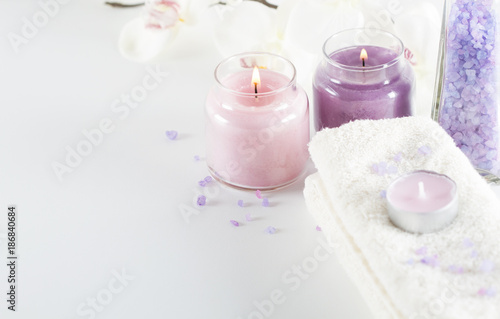 Spa concept.Sea salt  candles towels  orchid flowers
