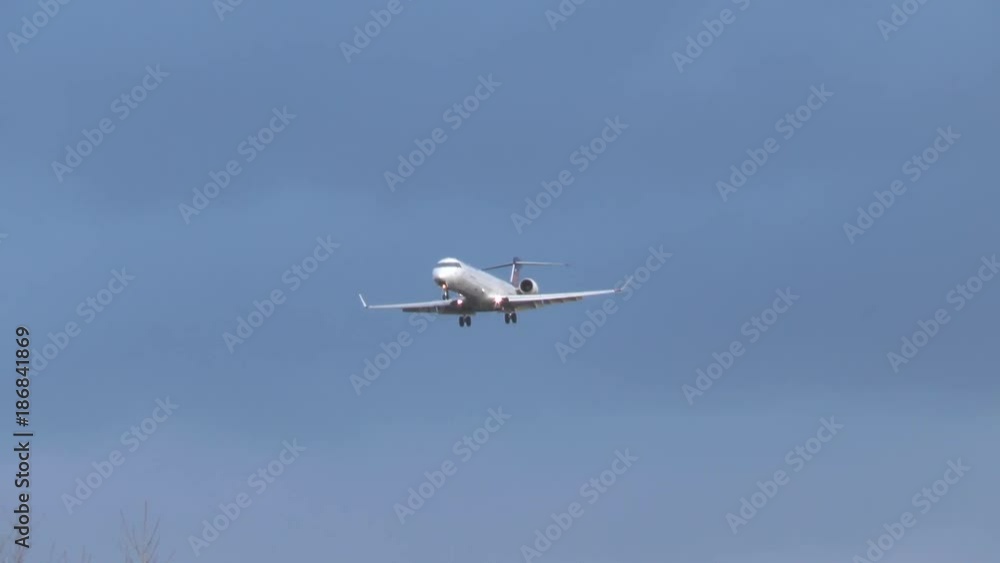 An airplane approaches the runway on Frankfurt airport during strong winds An airplane approaches the runway on Frankfurt airport during strong winds