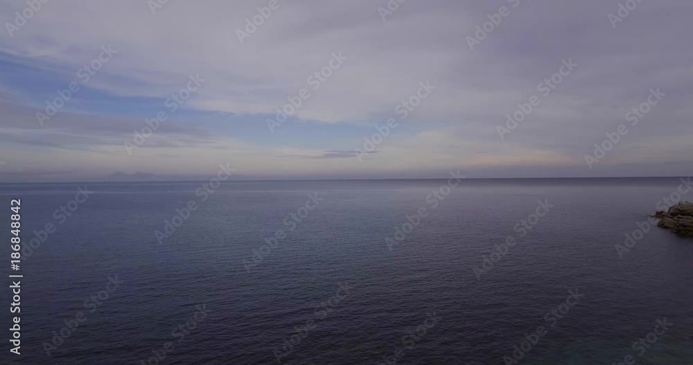 Aerial, beautiful calm sea on cloudy day Aerial, beautiful calm sea on cloudy day
