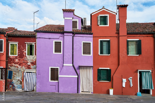 Burano, Venice. Colorful houses architecture at the square. Summer 2017, Italy