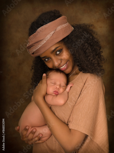 Happy Ethiopian mother with newborn baby