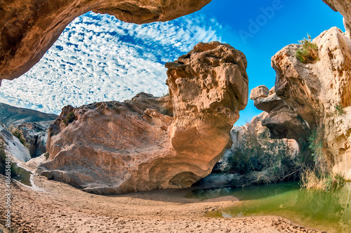 A picturesque oasis of Ein Yorkeam in the Negev Desert. Israel. photo