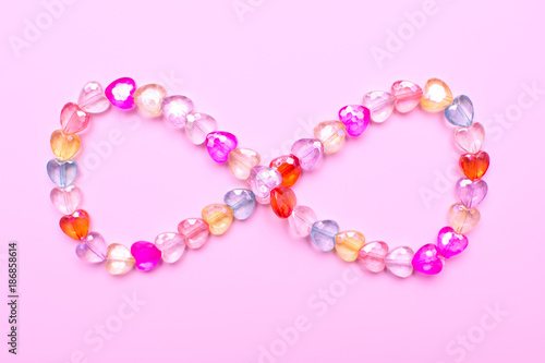 Love heart shape necklace in infinity shape for Valentines background photo
