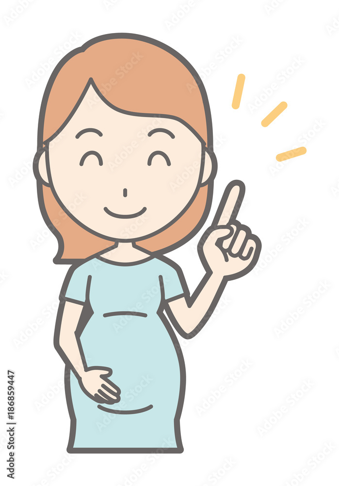 A pregnant woman wearing green's clothes points with a smile