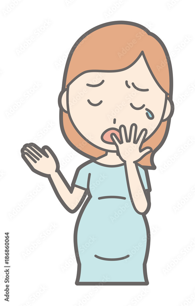 A pregnant woman wearing green clothes is yawning