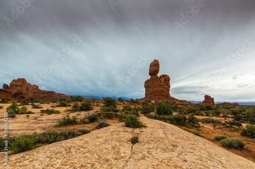 Balanced Rock, Arches National Park, Utah, profiled on stormy sky