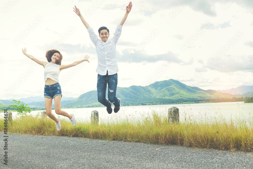Women lovers jumping together for take a photo for the best memories between travel. Women lovers jumping together for take a photo for the best memories between travel.