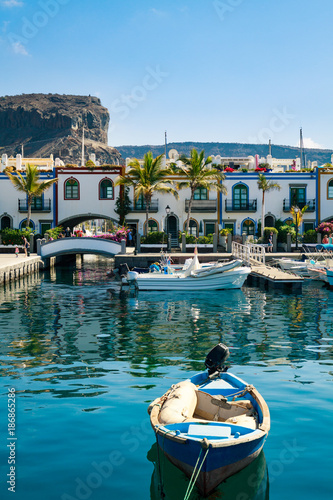 Colourful port with palm trees Puerto De Mogan on Gran Canaria island. photo