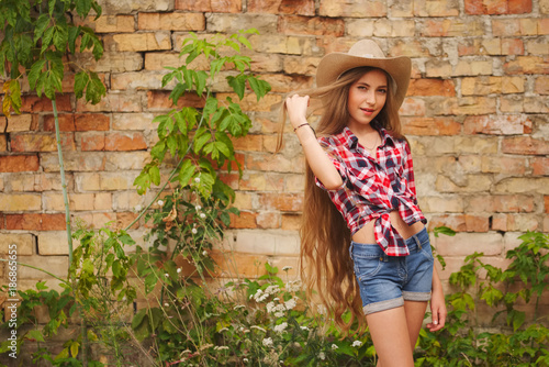 beautiful young girl with long hair © Aliaksei Lasevich