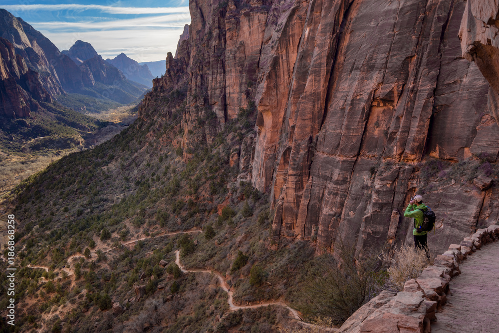 The Hiker Taking Pictures at Angels Landing Trail at Zion National Park