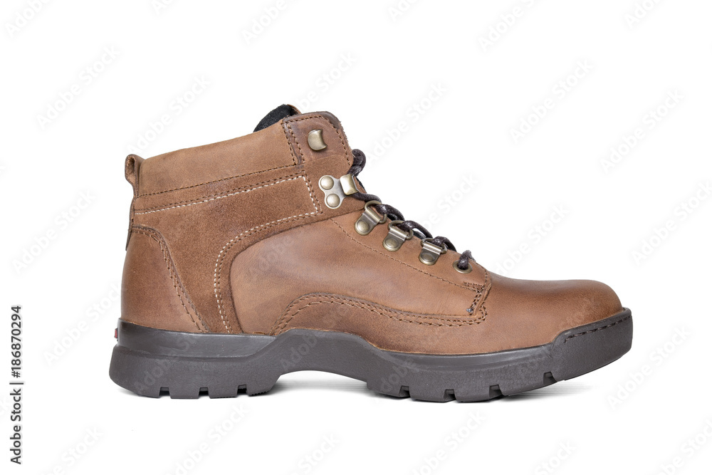 Male brown leather boot on white background, isolated product, comfortable footwear. Male brown leather boot on white background, isolated product, comfortable footwear.