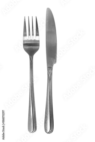 Silver fork and knife detail view isolated on white background