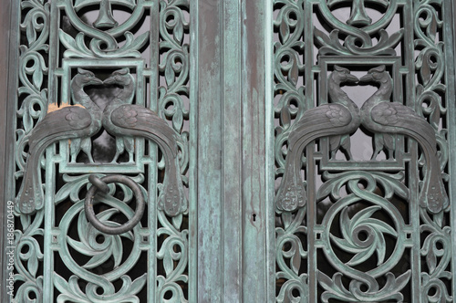 Old Iron Metal Doors on a Mausoleum in a Cemetery