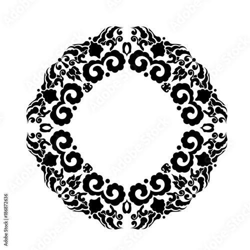 Black floral ornamement in circle form photo