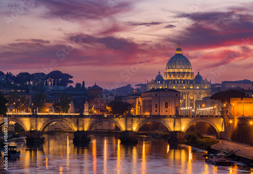 View to bridge and Vatican City at sunset. Rome, Italy photo