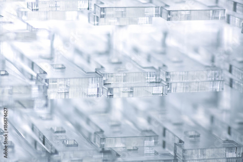 Abstract high-tech background. Details of transparent plastic or glass. Laser cutting of plexiglass.