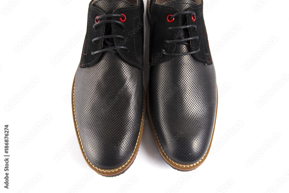 Male black leather shoe on white background, isolated product, comfortable footwear. Male black leather shoe on white background, isolated product, comfortable footwear.