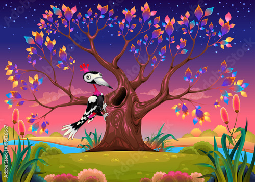 Happy tree in the countryside with woodpecker