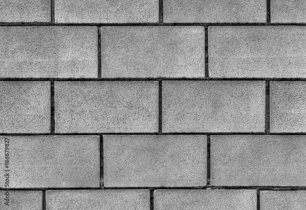 Fototapeta premium Stylish stone wall background in black and white